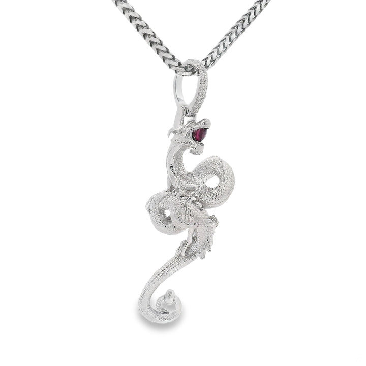 .925 silver mini 3D dragon pendant with ruby eye on silver chain.