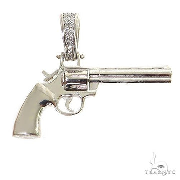 .925 silver revolver pendant with detailed grip and smooth barrel design.