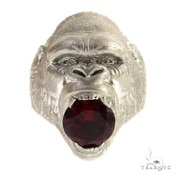 .925 silver gorilla head ring with large deep red rhodolite gemstone in open mouth.