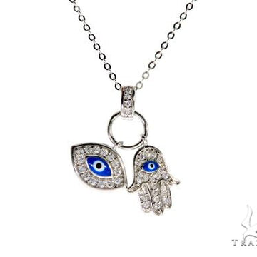 Sterling silver Hamsa hand and evil eye charms on 18-inch adjustable cable link chain.