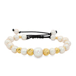 Unisex pearl bead bracelet with gold accents and adjustable black cord closure.
