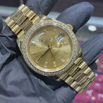 2020 Rolex Day-Date 40mm | 18K Yellow Gold | Factory Diamond Bezel and Champagne Baguette Dial