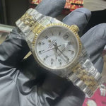 Rolex DateJust 31mm | Two Tone Yellow Gold | White Roman Dial 71562