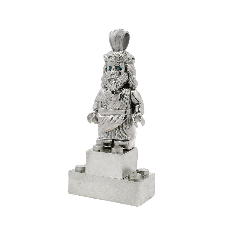 Silver TraxNYC Jesus pendant with blue diamond eyes on anchor cable chain.