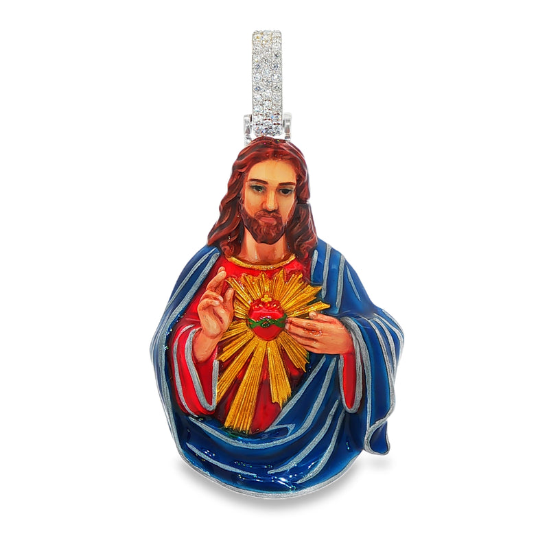 Silver enamel pendant depicting Jesus with sacred heart and blue robe.