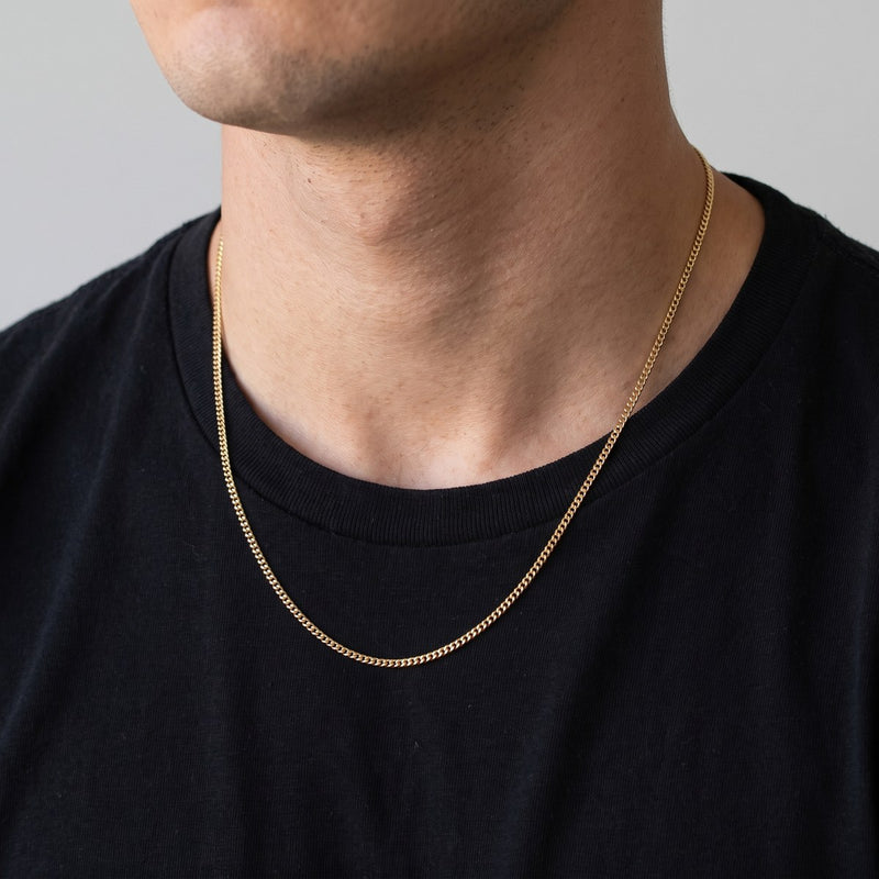 Worn look: 10K Gold miami cuban chain, 1.9 mm, made by AI from this chain's own photos, not a measured fit