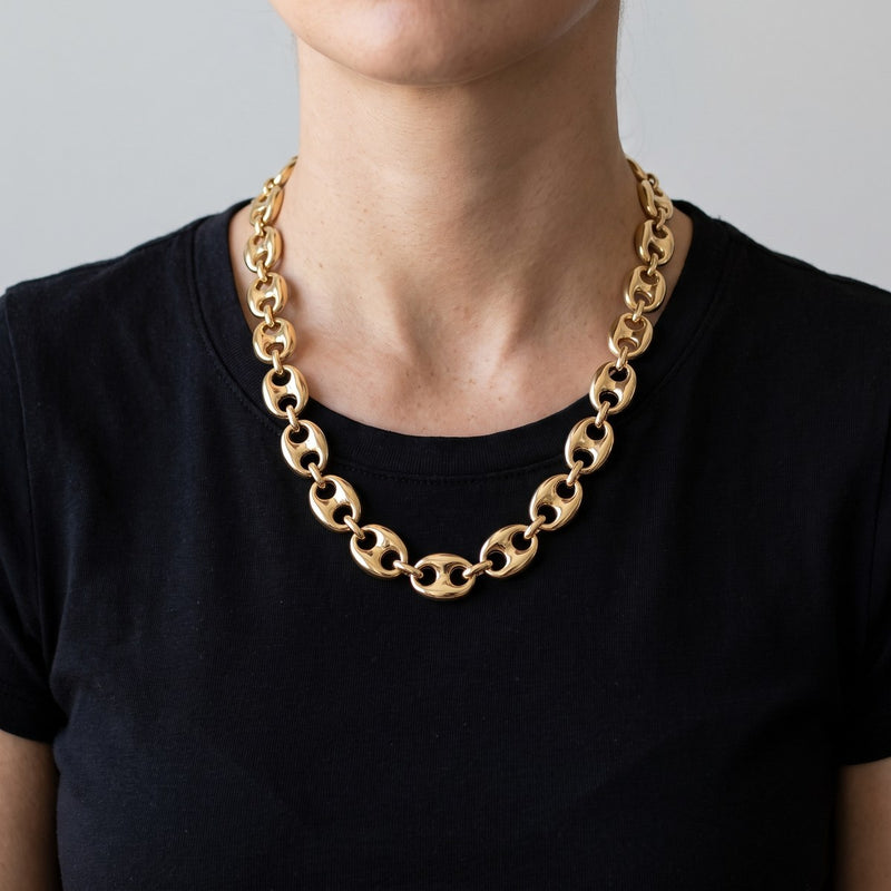 Worn look: 14k Yellow Gold Lite Puffed Mariner Chain 11mm 20 inches, made by AI from this chain's own photos, not a measured fit