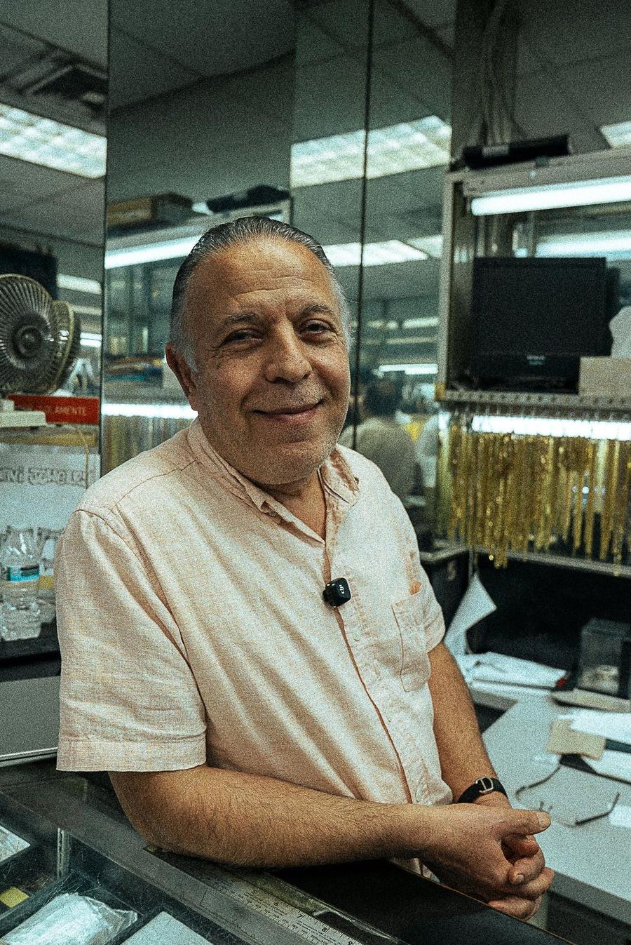 Henry Navi at his booth on 47th Street