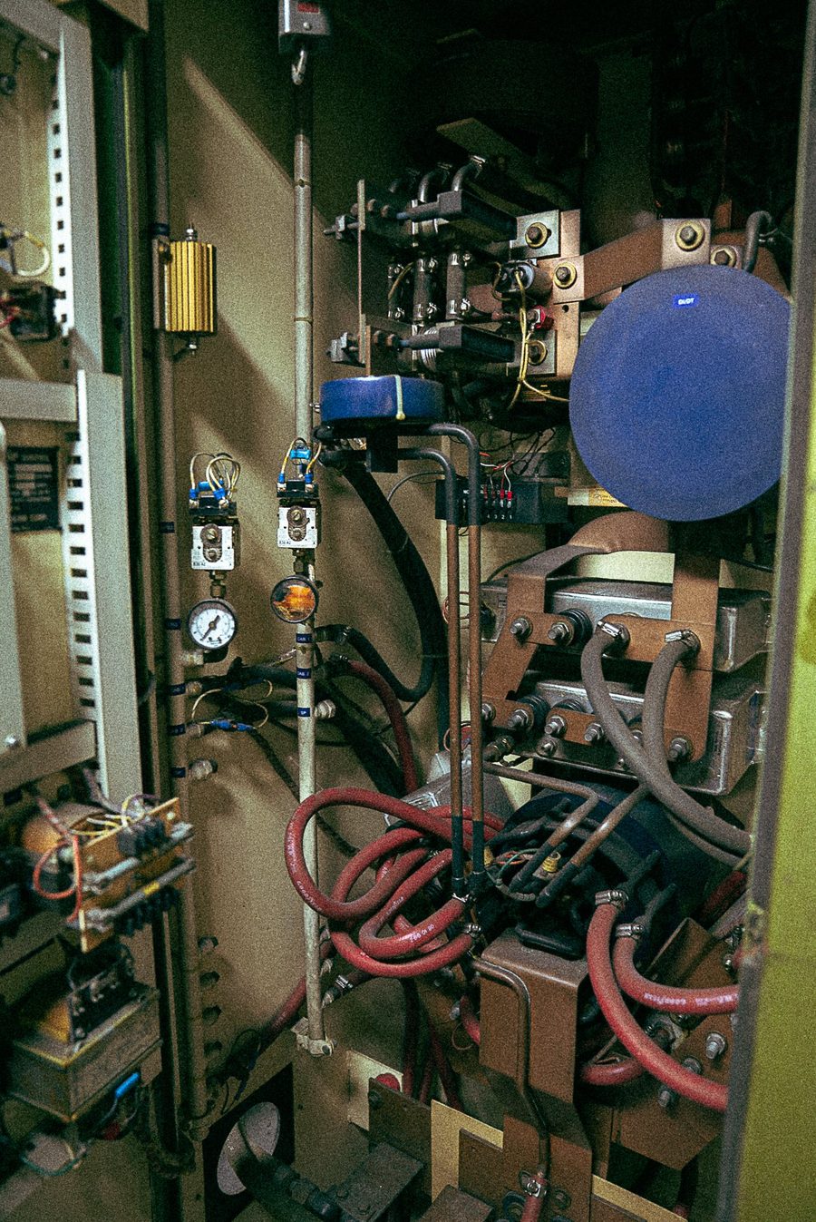 Inside the furnace starter cabinet: cables, hoses and gauges