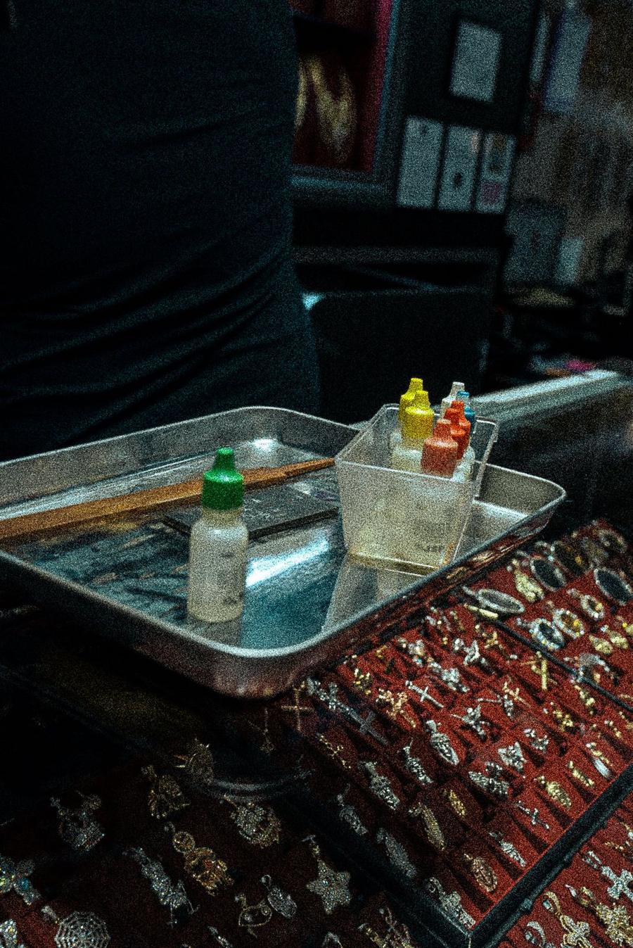Acid test bottles on a steel tray
